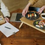 Women Eating Sushi at a Lunch Break